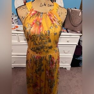 Yellow flowery dress.